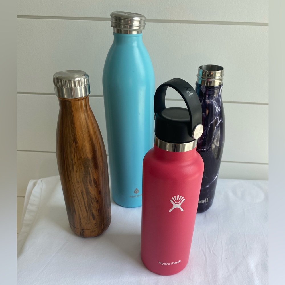 Set of 4 reusable stainless steel water bottles 1 Hydro flask 2 Swell 1 Manna